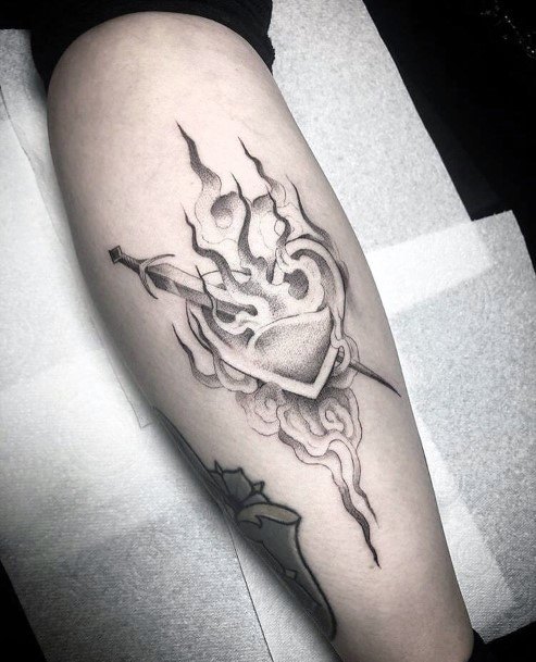 Stunning Flaming Heart Tattoo On Lady