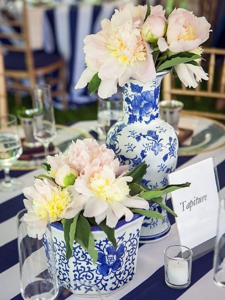 Stunning Floral Centerpiece Gorgeous White Blue Vase Wedding Table Inspiration