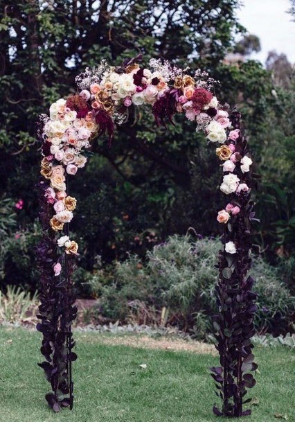 Stunning Floral Halloween Wedding Arch Ideas For Brides