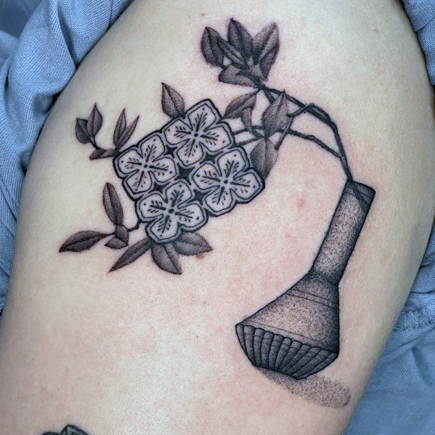 Stunning Flower Vase Tattoo On Lady