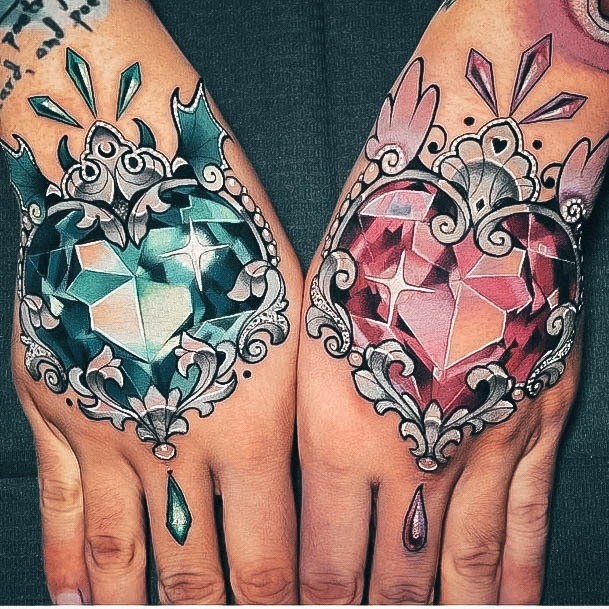 Stunning Gem Tattoo On Lady Hearts Hands