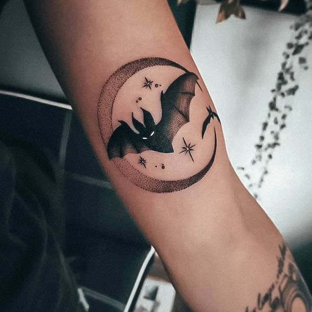 Stunning Girls Bat Tattoos