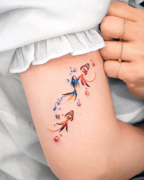 Stunning Girls Clown Fish Tattoos