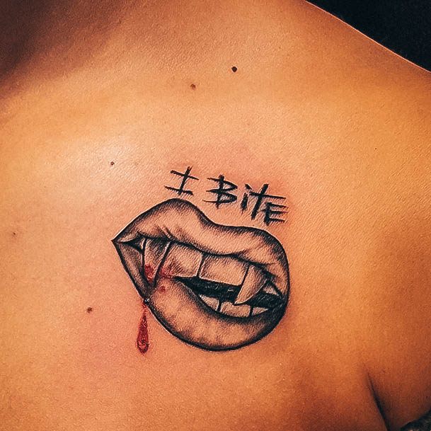 Stunning Girls Fangs Tattoos