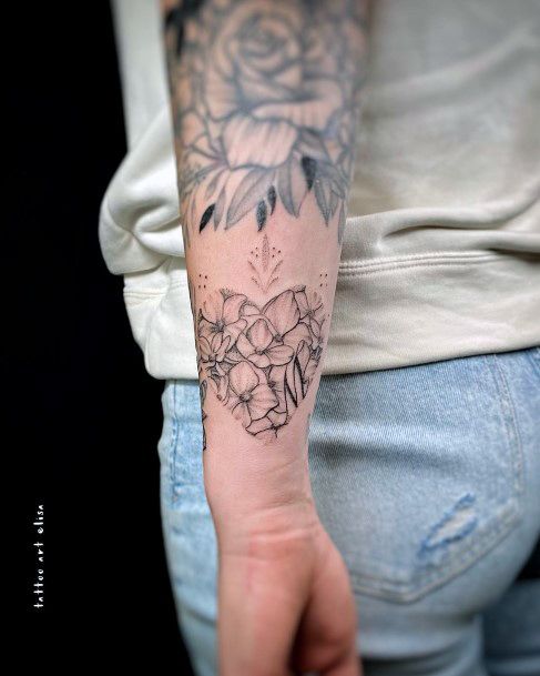 Stunning Girls Flower Heart Tattoos