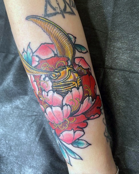 Stunning Girls Golden Snitch Tattoos