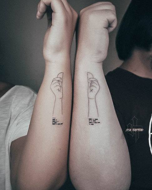 Stunning Girls Sibling Tattoos