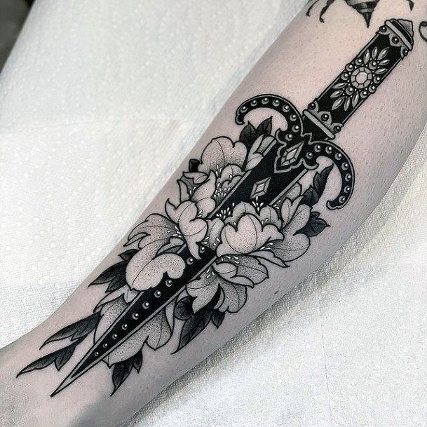 Stunning Girls Sword Tattoos