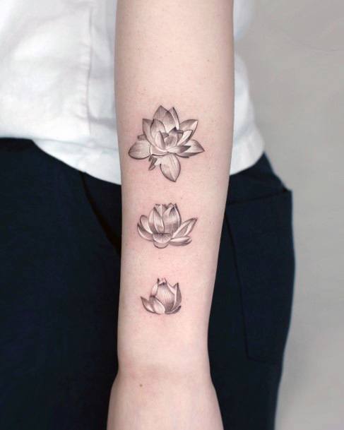 Stunning Girls Water Lily Tattoos
