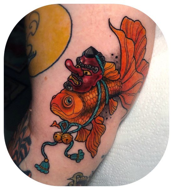 Stunning Goldfish Tattoo On Lady