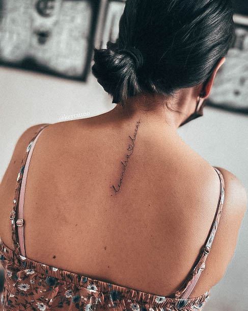 Stunning Lettering Tattoo On Lady