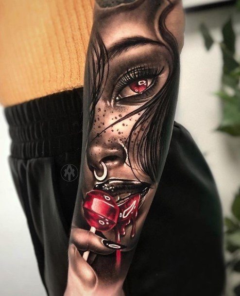 Stunning Lollipop Tattoo On Lady