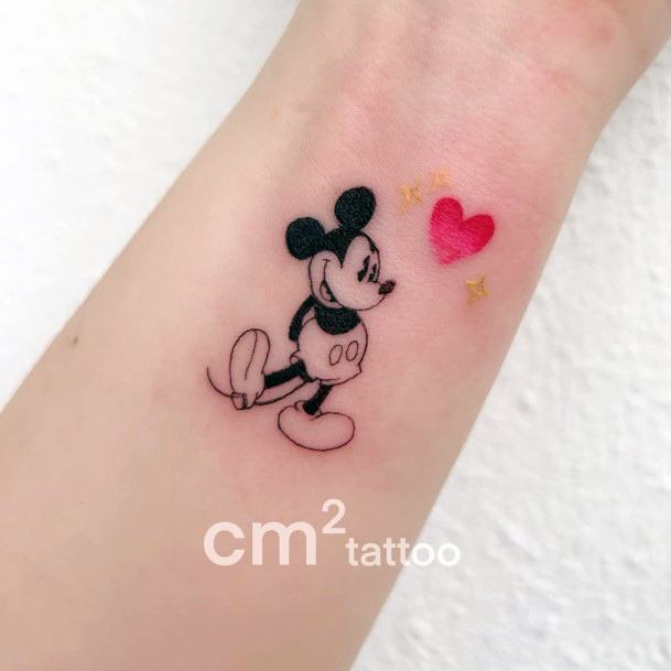 Stunning Mickey Mouse Tattoo On Lady