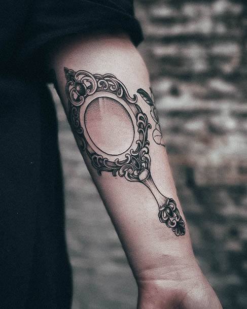 Stunning Mirror Tattoo On Lady