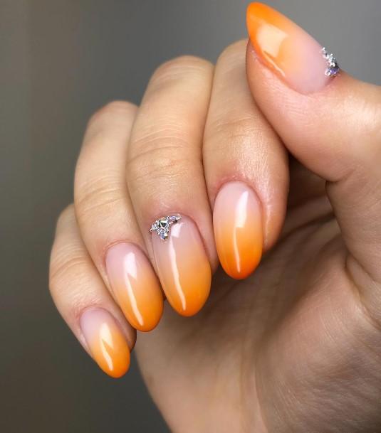 Stunning Orange Ombre Nail On Lady