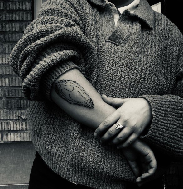 Stunning Oyster Tattoo On Lady