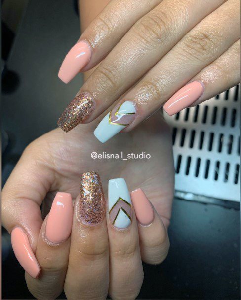 Stunning Pastel Salmon Pink Dazzling Gold Blue Triangle Style Nail Inspiration For Women