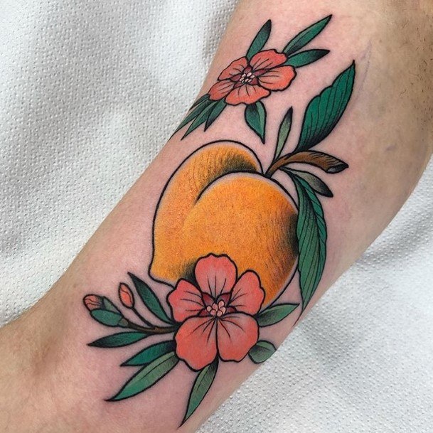 Stunning Peach Tattoo On Lady