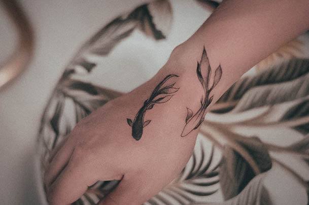 Stunning Pisces Tattoo On Lady