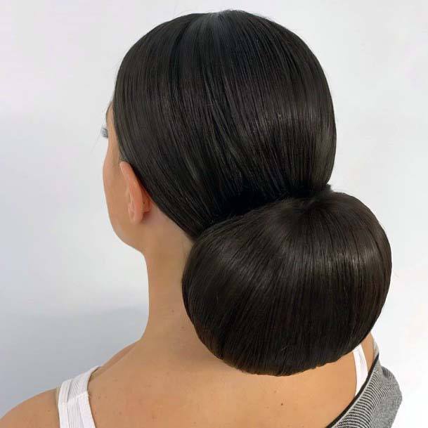 Stunning Polished Black Sleek And Shiny Bun Updo Hairstyles For Women