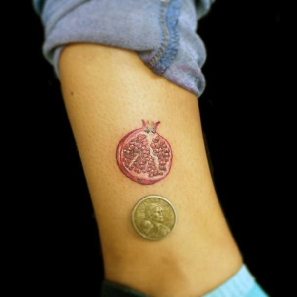 Stunning Pomegranate Tattoo On Lady