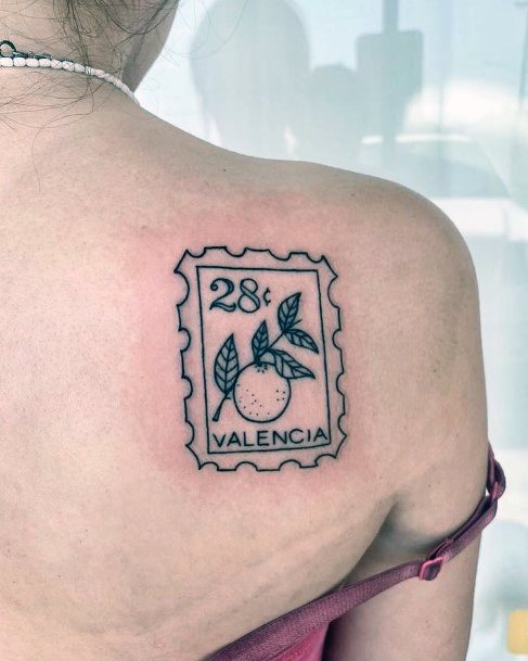 Stunning Postage Stamp Tattoo On Lady