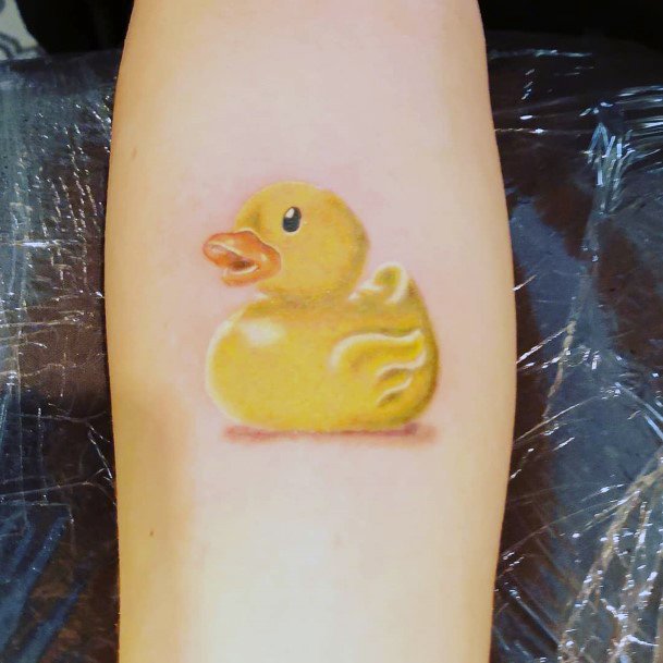 Stunning Rubber Duck Tattoo On Lady