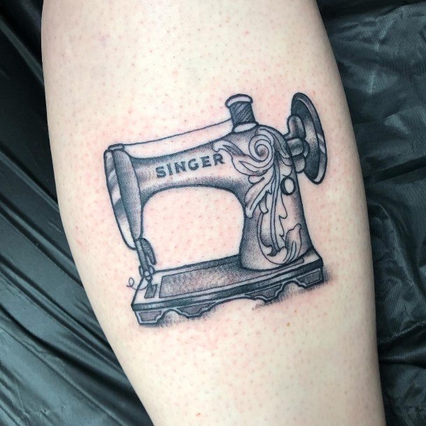 Stunning Sewing Machine Tattoo On Lady