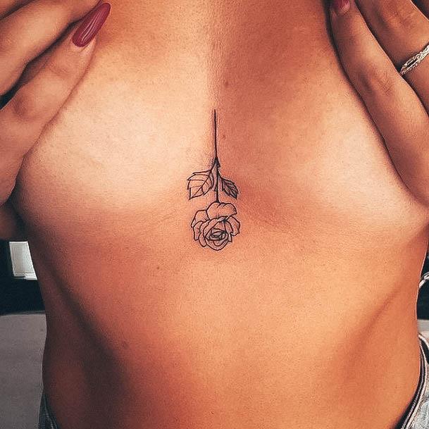 Stunning Small Chest Tattoo On Lady