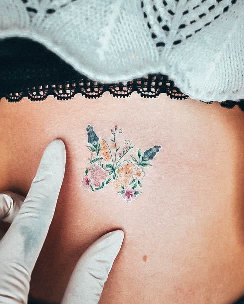 Stunning Small Flower Tattoo On Lady