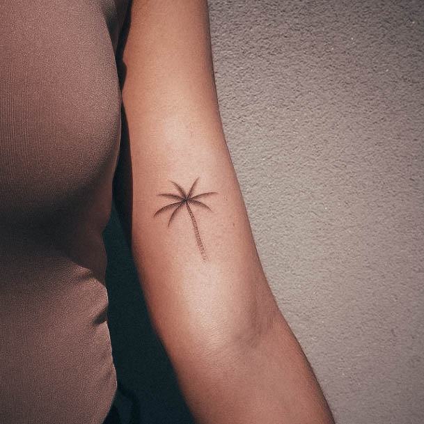 Stunning Small Simple Tattoo On Lady