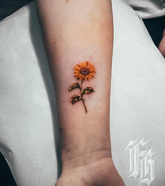 Stunning Small Sunflower Tattoo On Lady