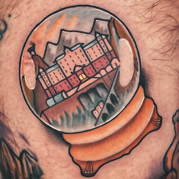 Stunning Snowglobe Tattoo On Lady