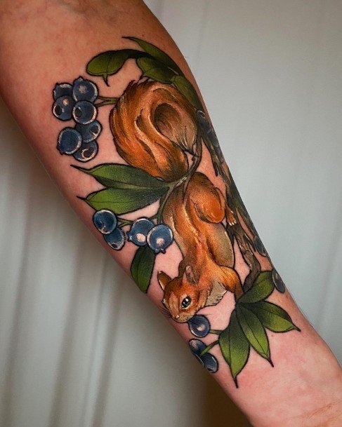 Stunning Squirrel Tattoo On Lady