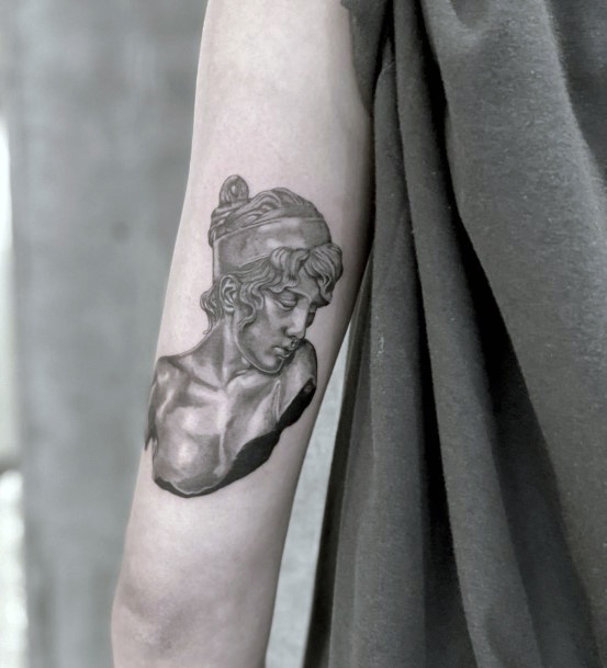 Stunning Statue Tattoo On Lady