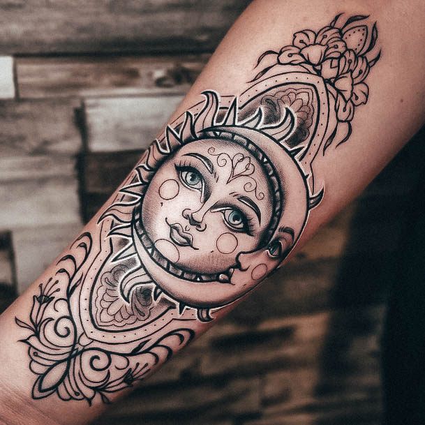 Stunning Sun And Moon Tattoo On Lady