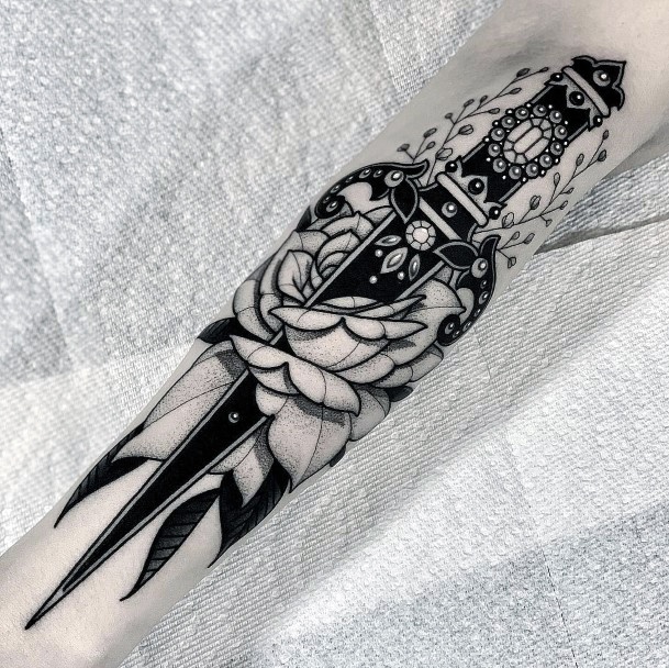 Stunning Sword Tattoo On Lady