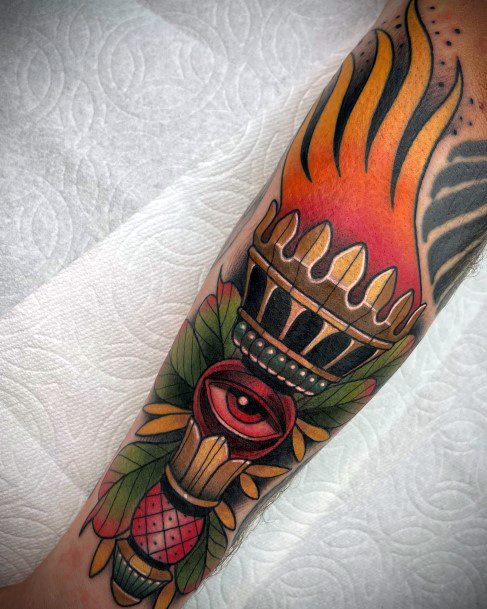 Stunning Torch Tattoo On Lady