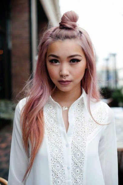 Stunning Woman With Long Pink Hair In Top Knot Hairstyle