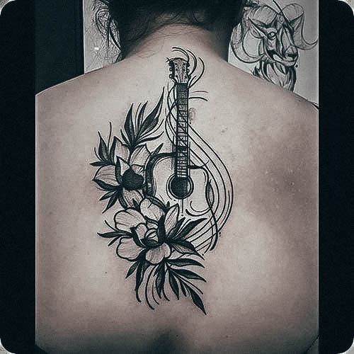 Stylish Womens Guitar Tattoo On Back