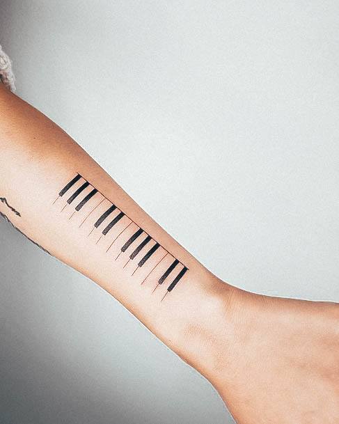 Stylish Womens Piano Tattoo