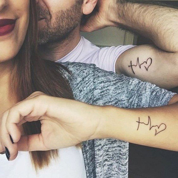 Sugary Beating Heart Tattoo Couples Arms