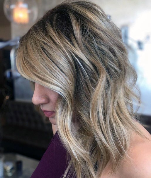 Sun Kissed Warm Blonde Soft Highlights Hairstyle For Brunette Women