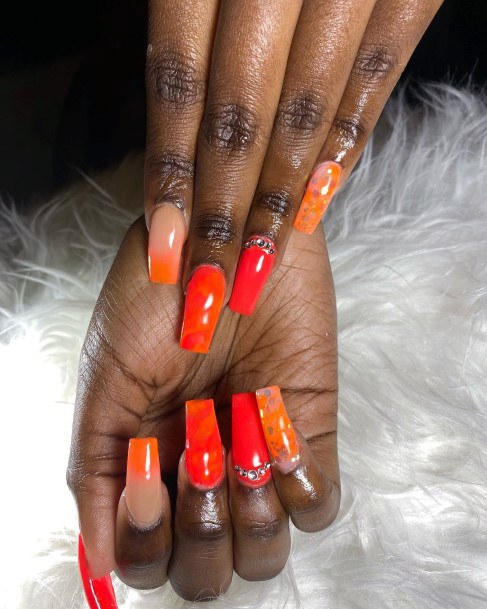 Sunset Orange Design On Long Nails Women