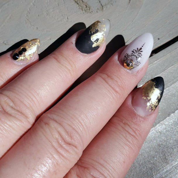 Swank Black And Gold Nails