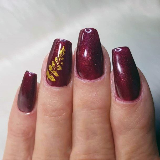 Sweet Girly Glossy Maroon And Cute Gold Leaves Nail Design Ideas