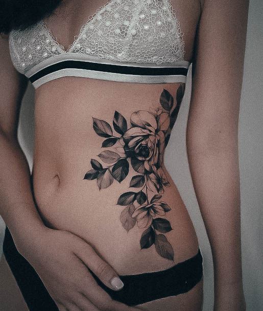 Sweet Rib Tattoo Designs For Girls