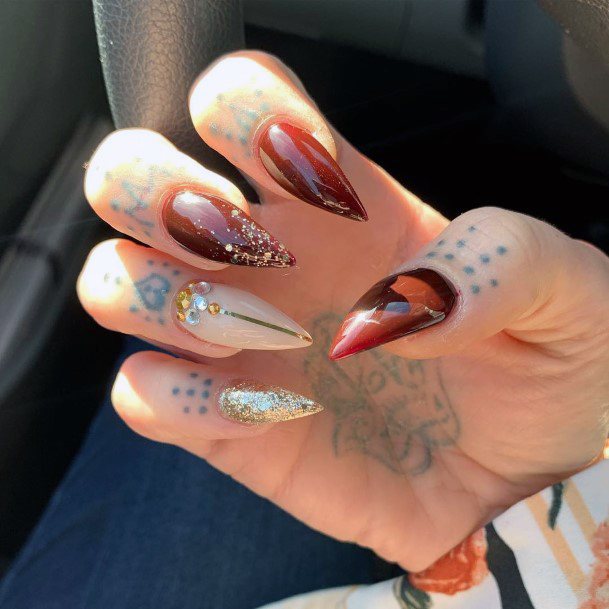 Sweet Stiletto Maroon And Dazzling Gold Nails Amazing Gem Art Ideas For Ladies