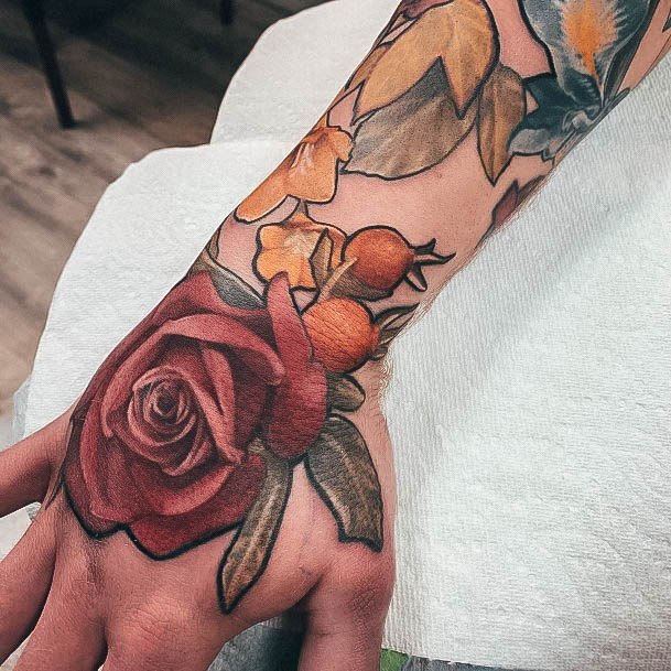 Tattoo Ideas Womens Rose Hand Design