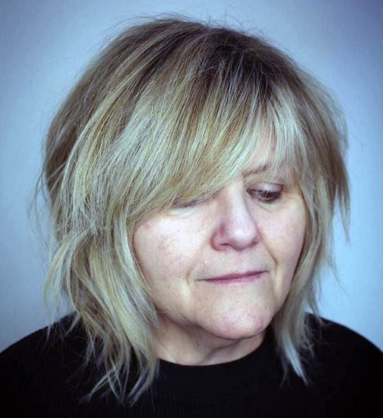 Tendrils And Fringe Hairstyles For Over 50 With Round Face